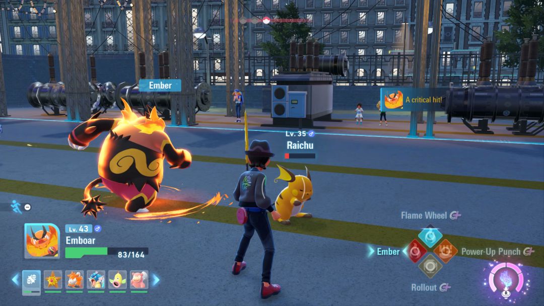 View from behind the Pokemon Trainer, as Raichu recovers from a hit by Emboar.