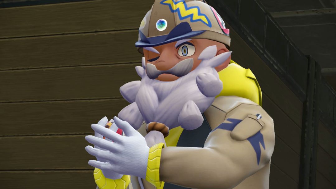 Tarragon holds a Poke Ball in his hands, preparing to unleash the Hippowdon.