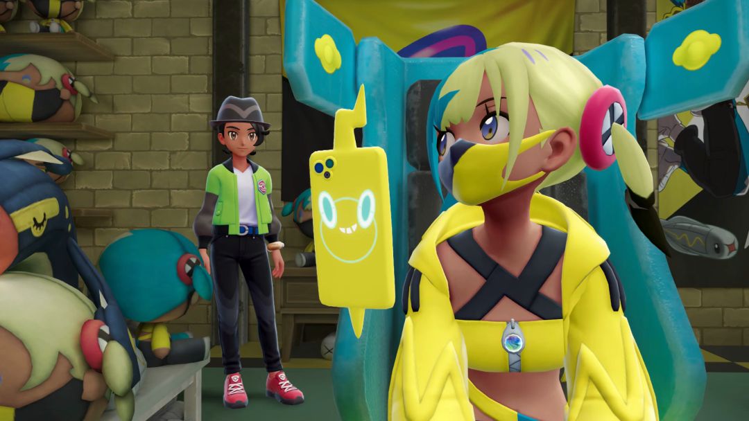 Canari is in the middle of a broadcast at her desk, but is looking over her shoulder at the Pokemon Trainer, who has entered her room.