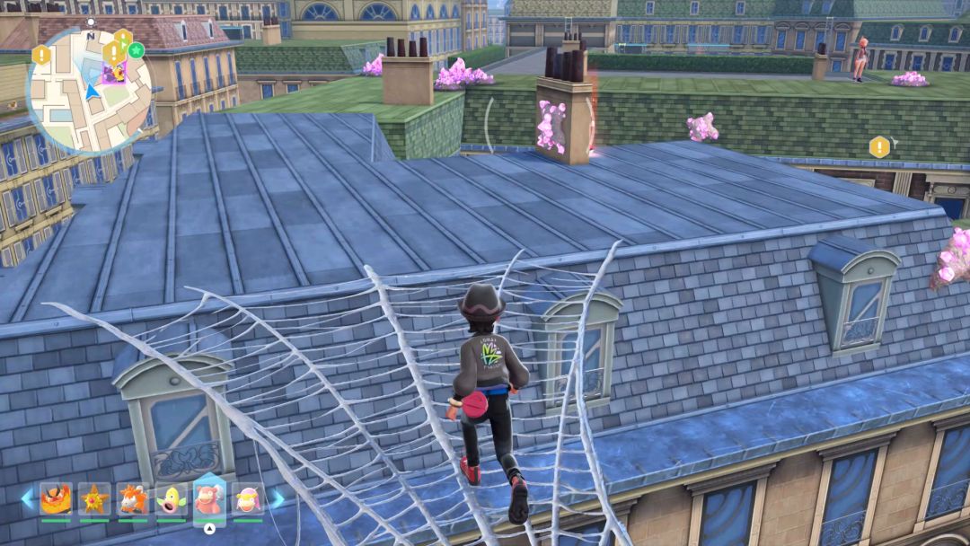 Running across the second webbing bridge, the Pokemon Trainer looks ahead at a blue roof, and sees Taunie standing near the end of some green rooftop beyond it.