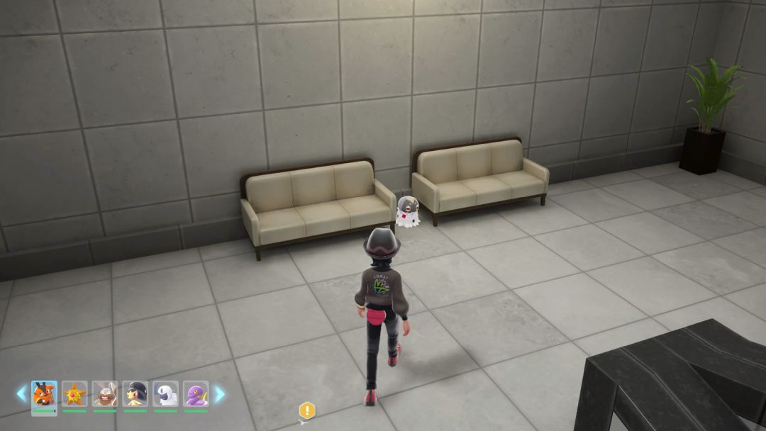 (02) A Spewpa standing between sofas on the landing between the first and second floors.