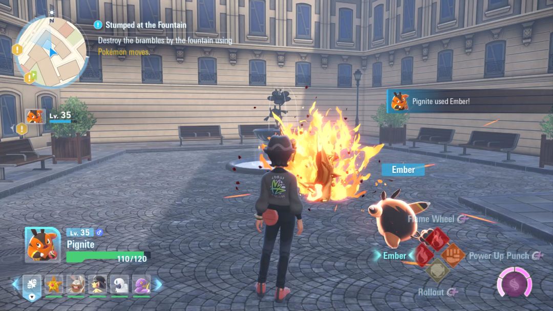 The Pokemon Trainer watches as his Pignite burns a patch of brambles with its Ember ability.