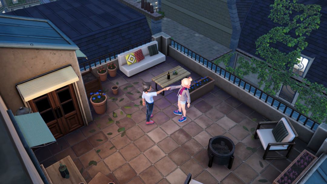 The Pokemon Trainer and Taunie fist bump as they stand on a rooftop overlooking Lumiose City.