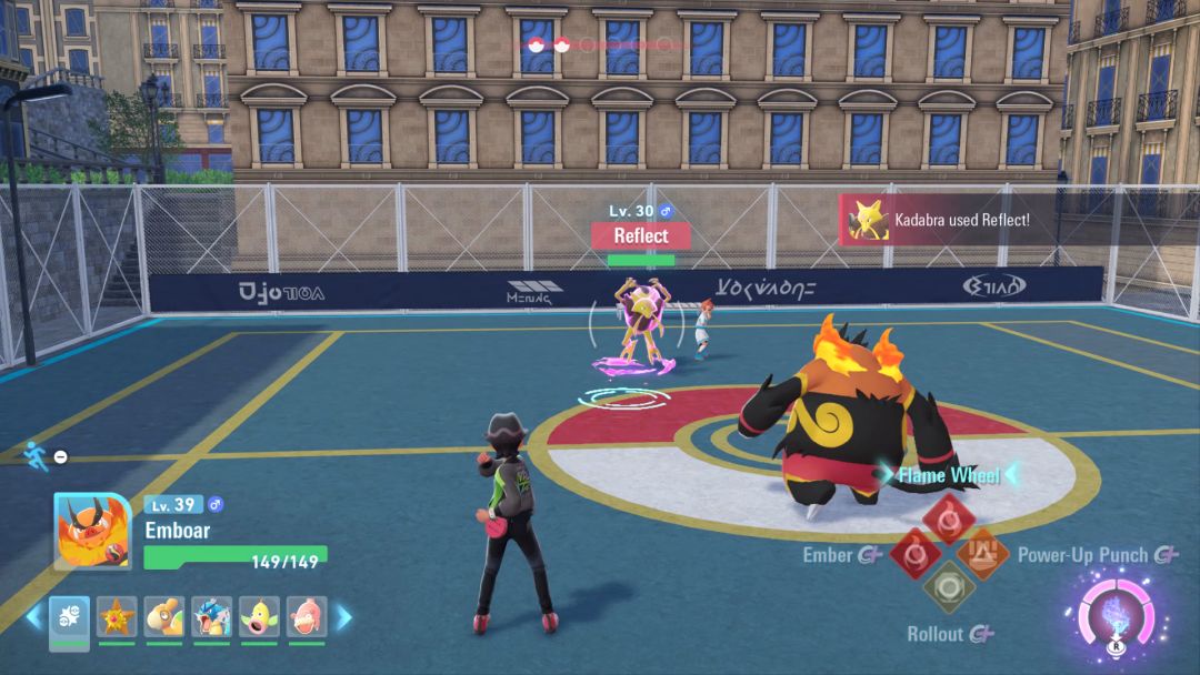 As the enemy Kadabra throws up a Reflect barrier, the Pokemon Trainer sends his Emboar lumbering toward it.
