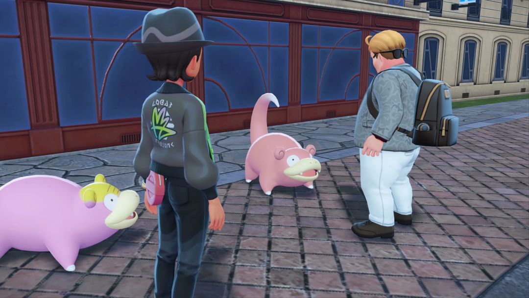 The Pokemon Trainer and Quille stand on the sidewalk, looking at the Galarian Slowpoke and the standard Slowpoke they have just traded.