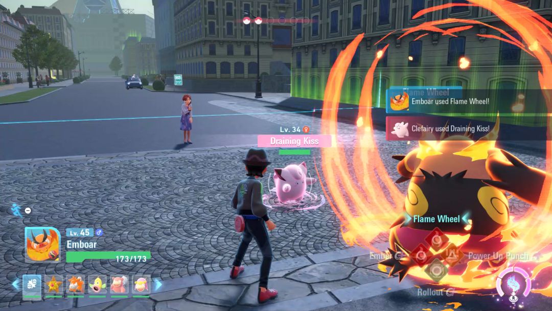 The Pokemon Trainer stands nearby as the Emboar launches a Flame Wheel attack against the approaching Clefairy.