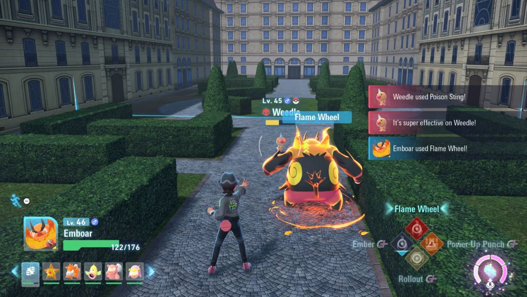 The Pokemon Trainer urges his Emboar to attack the red-eyed Weedle among the neatly-trimmed hedges.